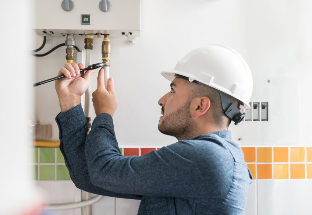 homem instalando gás me residência